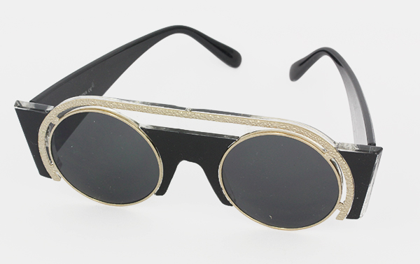 Rund solbrille i eksklusivt design. Sort med guld