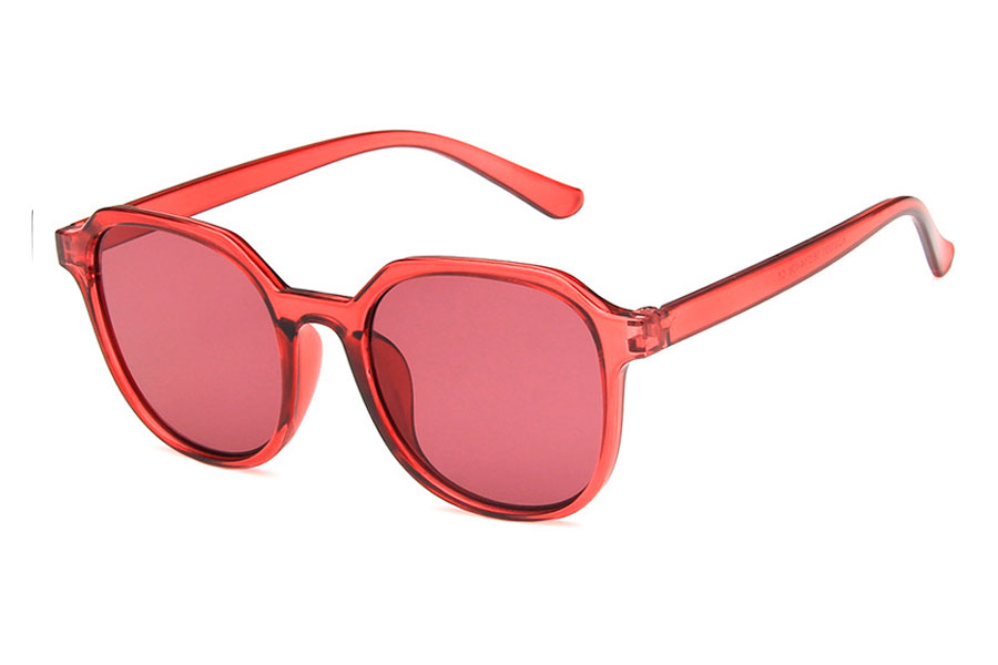 Dame solbrille i mørk pink transparent stel med rødelige glas