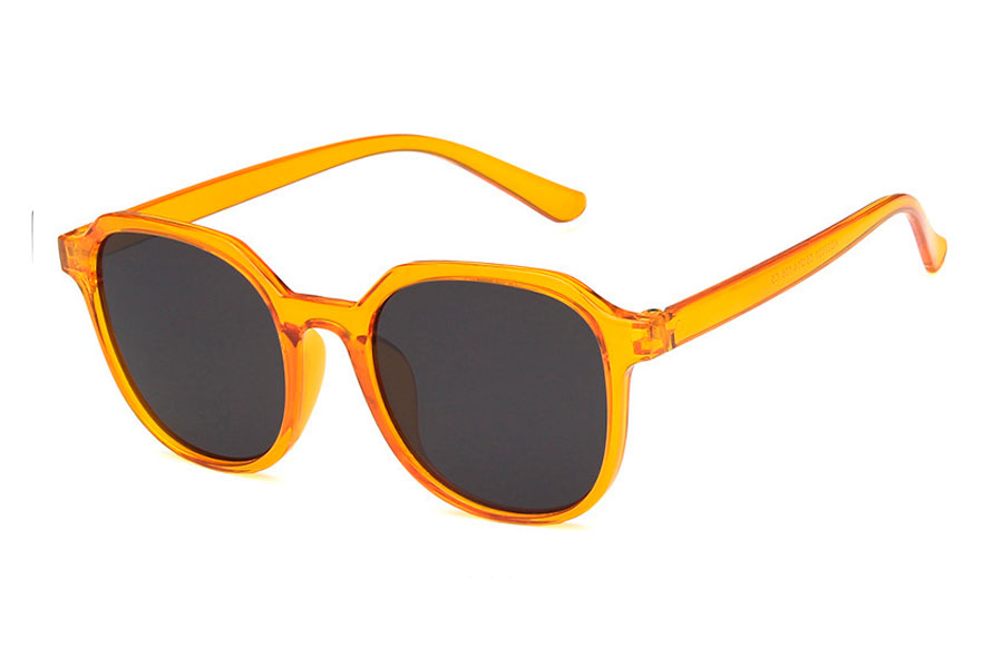 Dame solbrille i orange transparent stel