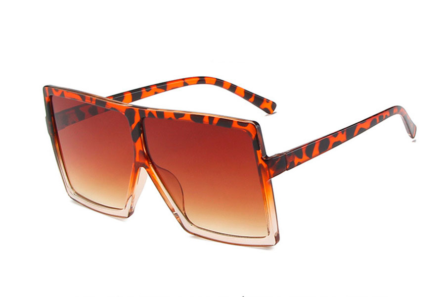 Kæmpe oversize solbrille i stort og fladt design.
